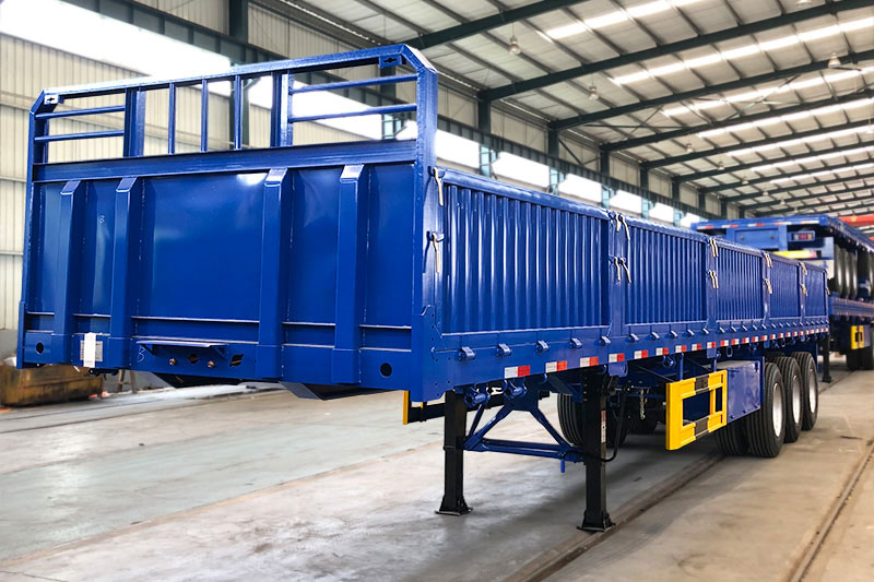 Semirreboque lateral de queda de 3 eixos